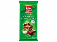 Cioccolato al latte con nocciole tritate , prezzo 0,75 € ...