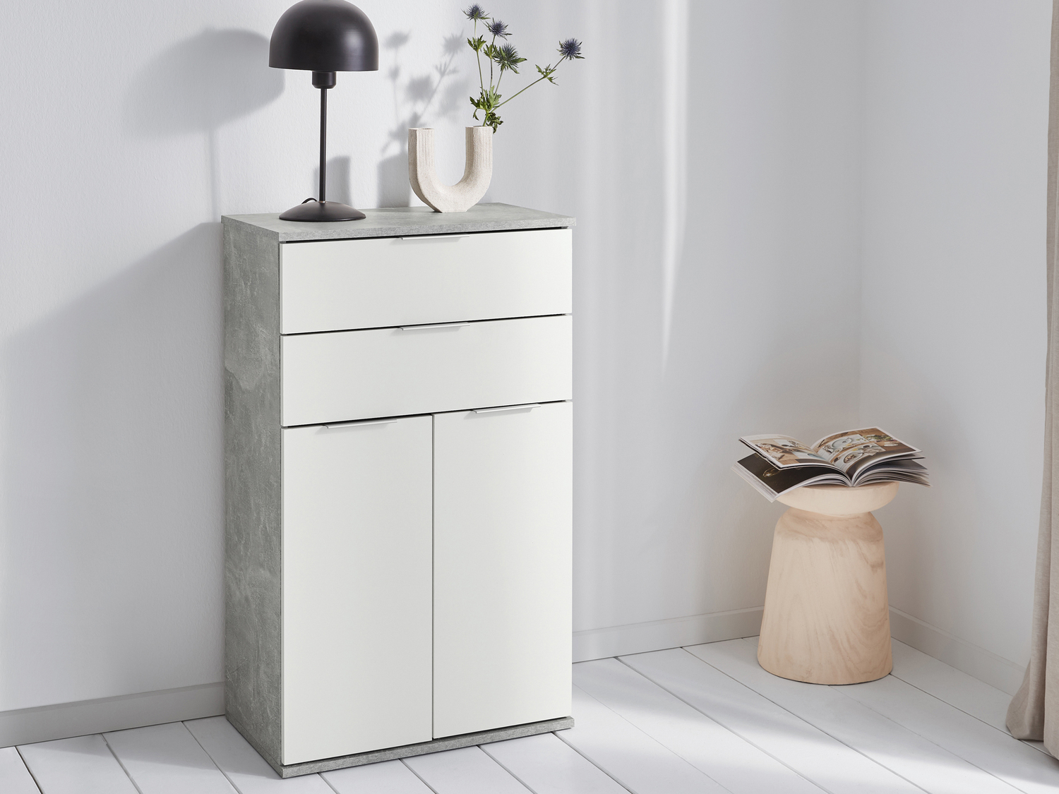 Mobiletto con 2 cassetti e 2 ante Livarno, prezzo 49.00 €
Bianco e grigio ...