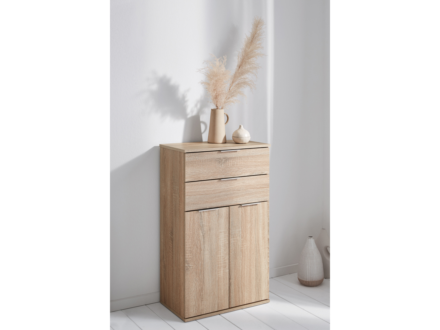 Mobiletto con 2 cassetti e 2 ante Livarno, prezzo 49.00 €
Color rovere ...